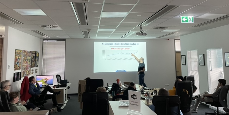 Jani presenting MRR growth at an Arenim meeting