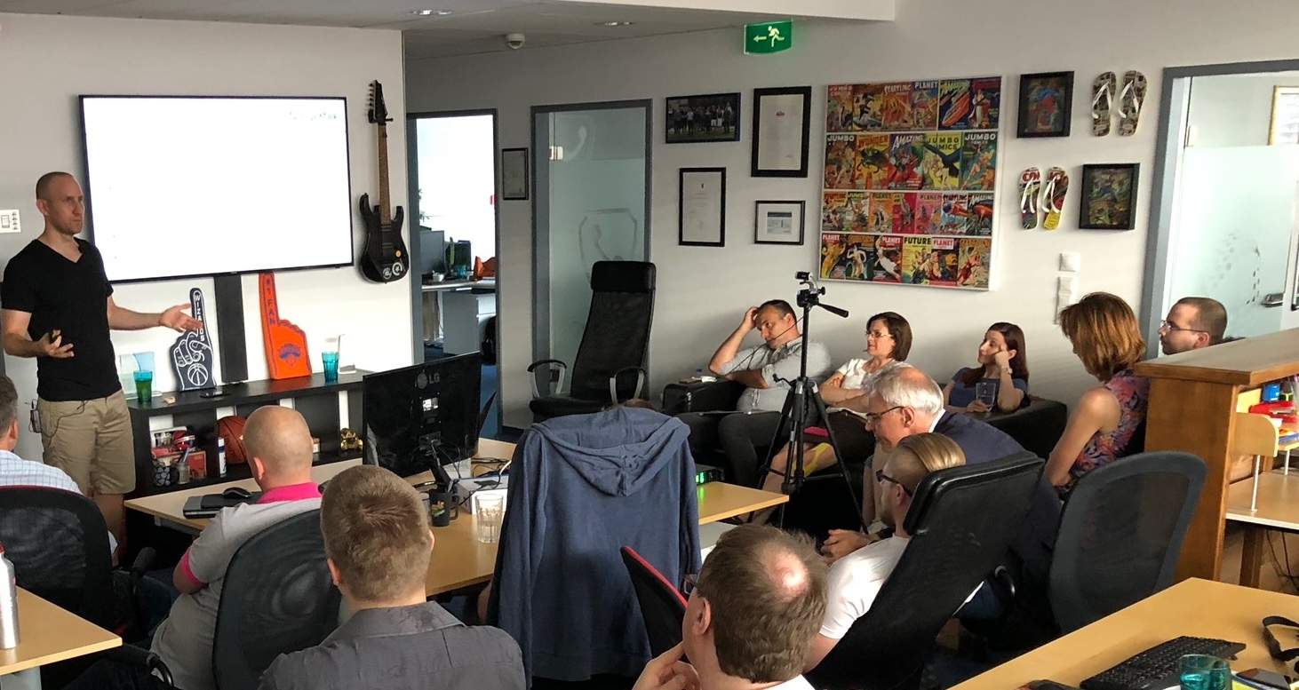 Szabolcs Kun, CEO of Arenim, delivering a quarterly company presentation at the Infopark office, 2016